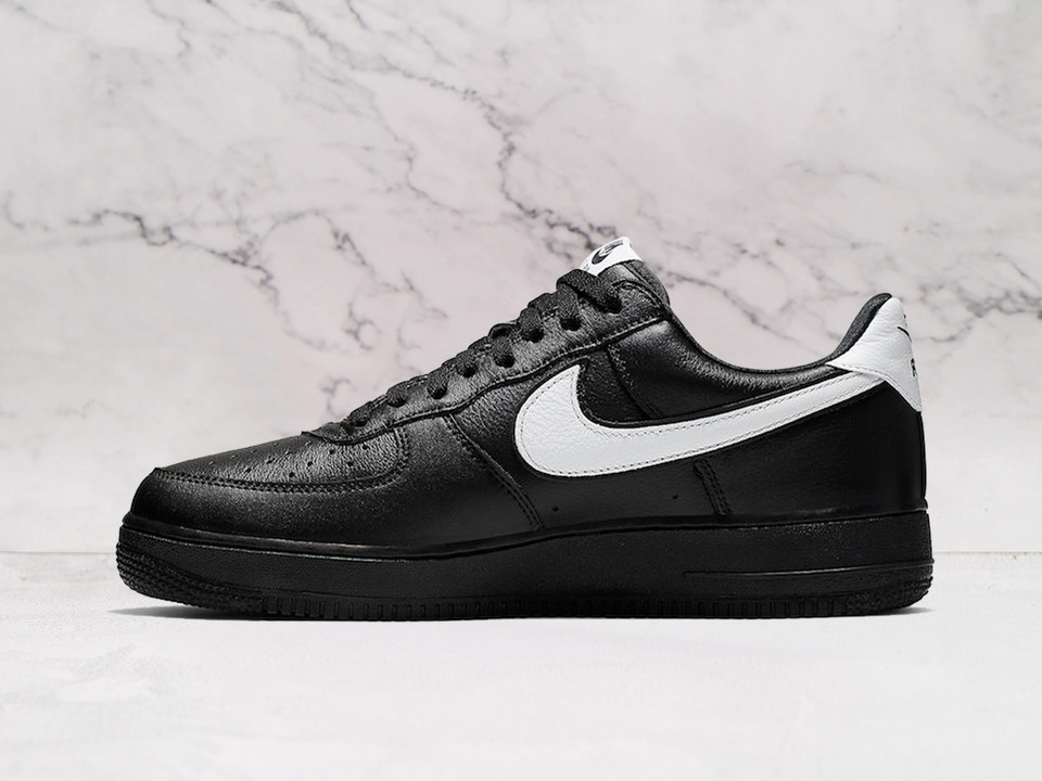 Nike Air Force 1 Low Black White QS (CQ0492-001)—white heel tab, black sole.