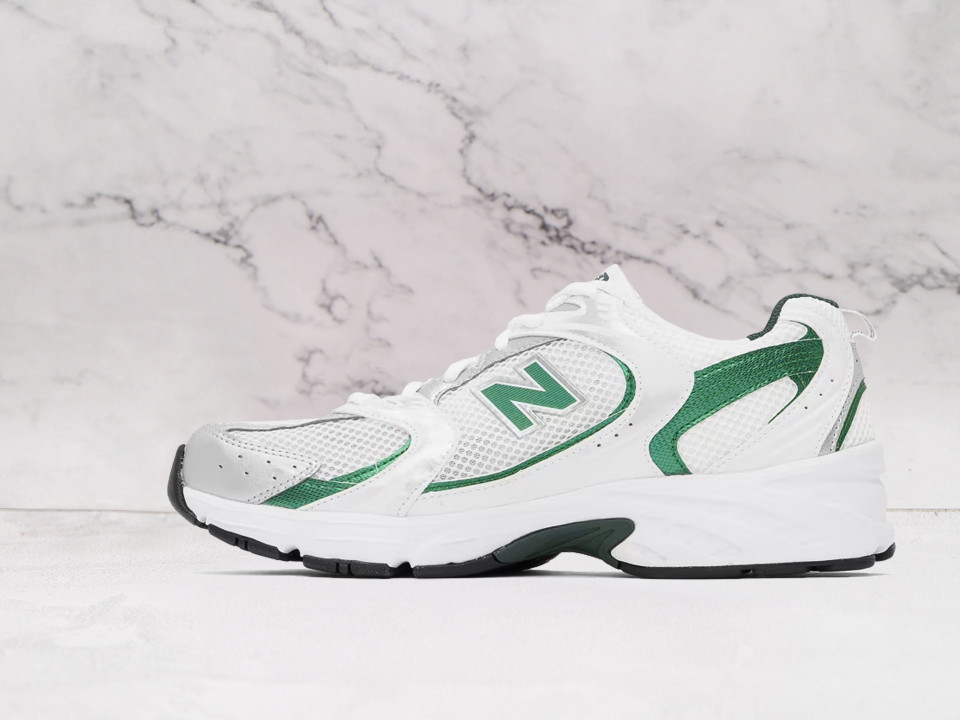 NB 530 – Clean White with Vibrant Green Accents