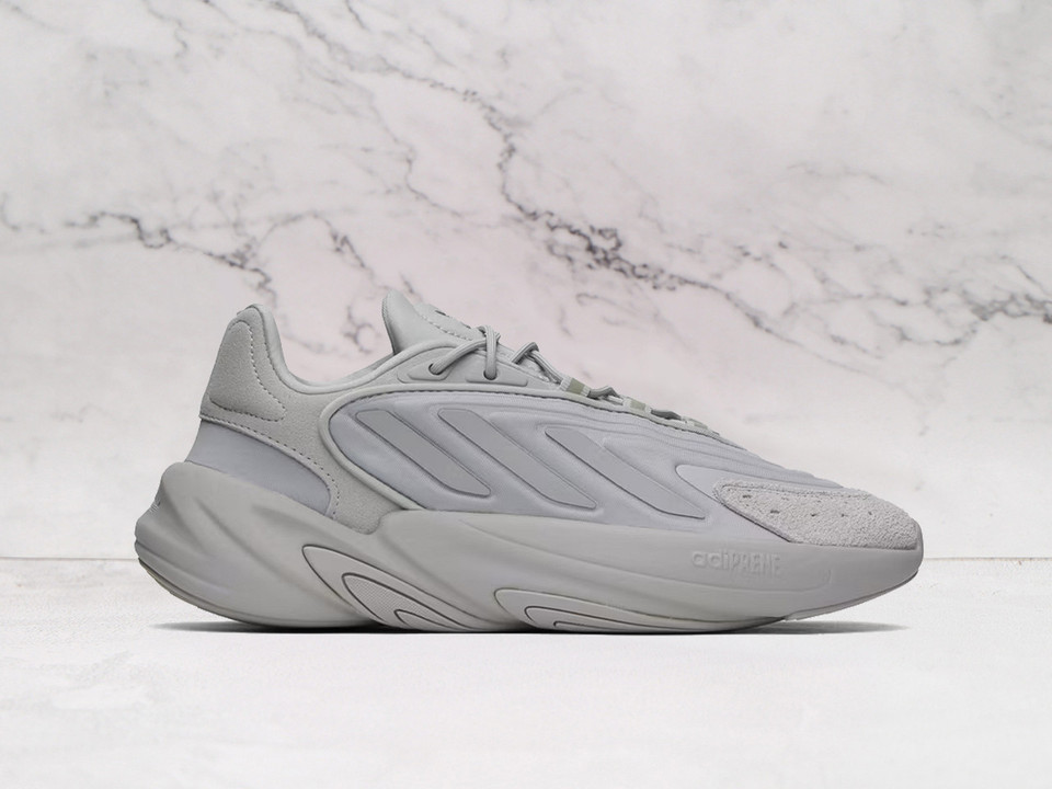 ADIDAS Gray Ozelia Sneakers – Streamlined & Comfortable ADIDAS Gray Ozelia Sneakers – Streamlined & Comfortable