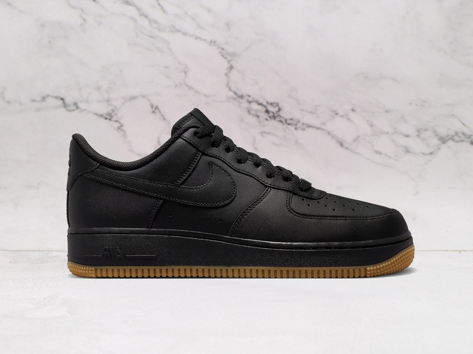 Nike Air Force 1 Low '07 Black Gum sneaker with black suede and gum sole.