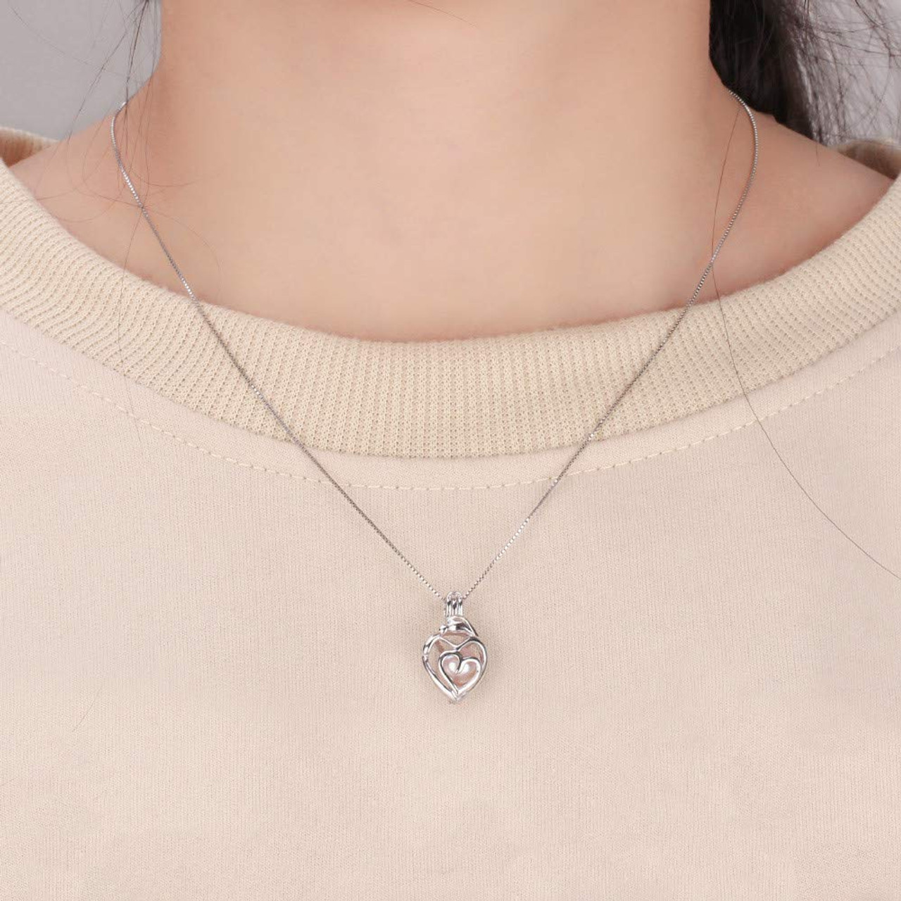 Pearl Cage Pendant Necklace 2020 New Love Wish Natural Oyster Pearl Design  Fashion Hollow Locket Clavicle Silver Chain Necklace Wholesale From  Angels_pearl, $1