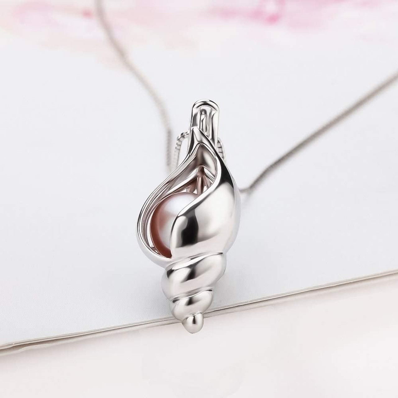 Conch Pearl in Cage Necklace  Huge Cage Pendants Selection