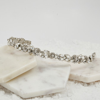 Handmade silver mini crown encrusted with all Swarovski crystals.