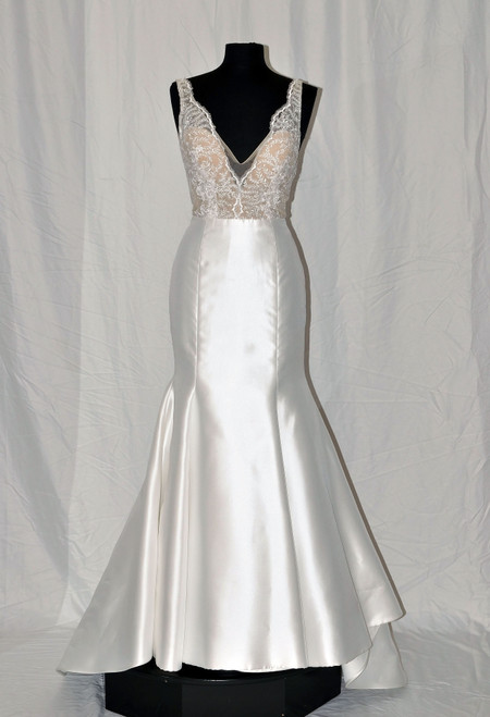 Mikado trumpet gown, scalloped V-neckline front and back, floral embroidered lace bodice with nude sweetheart lining, natural waist, chapel train.