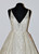 Lazaro 3662 Ivory silver shimmer tulle bridal ball gown, V neckline front and back, sweetheart lined bodice, natural waist, box pleated skirt, chapel train.