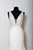 Ivory shimmer lace sheath gown, deep v plunging neckline with nude side cut outs on bodice, nude illusion back v neckline, slim skirt and chapel train.