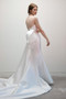 Draped V neck bodice with seamed midriff details and couture back bow.