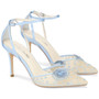 Sequined petals are meticulously stitched together to form two brilliant roses on the toe of Norah, white floral heels. Shimmering beads and sequins catch the light with every glittering step. These ivory flower shoes with ankle strap feature a seductive cutout design at the heel.

