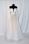 Novelty beaded bodice, with embroidered flroal details. French soft tulle skirt. Light weight construction, Detachable bow, and detachable off-shoulder balloon sleeves. Chapel train.



Available in Ivory/Ivory and Ivory /Lt. nude