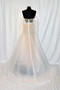 Novelty beaded bodice, with embroidered flroal details. French soft tulle skirt. Light weight construction, Detachable bow, and detachable off-shoulder balloon sleeves. Chapel train.



Available in Ivory/Ivory and Ivory /Lt. nude