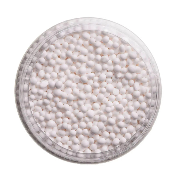 BASF 3/16" Selexsorb CD desiccant balls. Displayed in glass bowl.