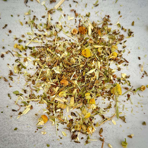 Siply's Chamomile Bliss premium, organic, loose leaf tea, featuring Chamomile, tulsi, oatstraw, peppermint and lemon balm, displayed on a stone table