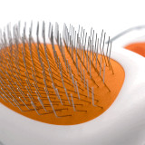 Wahl Metal Slicker Brush for Cats & Dogs, small size, features fine metal bristles and ergonomic grip.