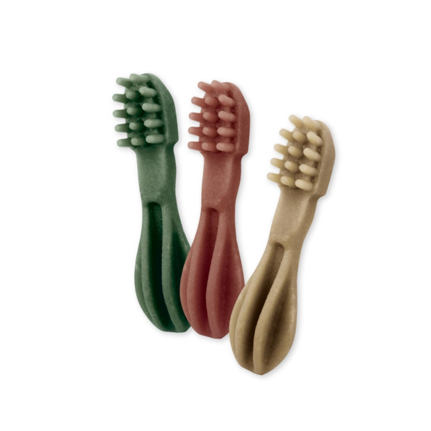 Whimzees X-Small Dental Dog Treats in green, red, and beige toothbrush shapes, 48 pack.