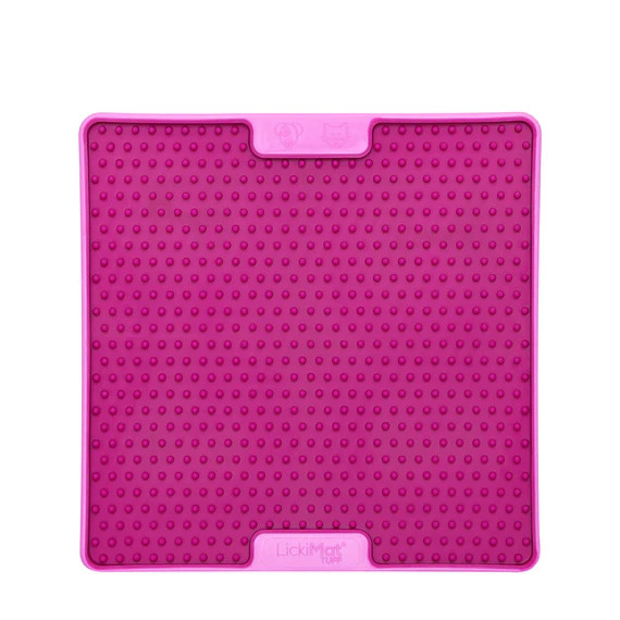 LickiMat TUFF PRO Soother in vibrant pink, designed for slow feeding and anxiety reduction in dogs.