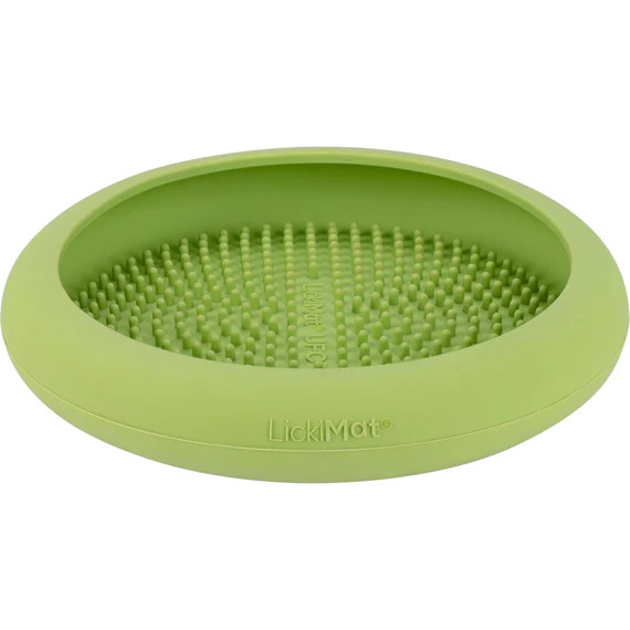 Green LickiMat UFO Interactive Pet Feeder with textured surface for engaging dog and cat feeding.