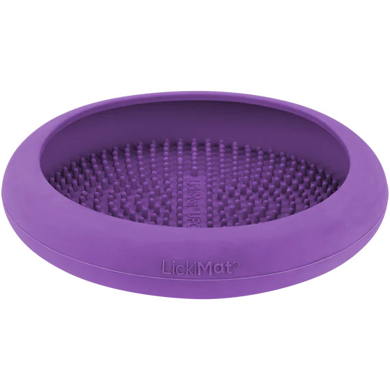 Purple LickiMat UFO Interactive Pet Feeder with textured surface for engaging dog or cat meals.