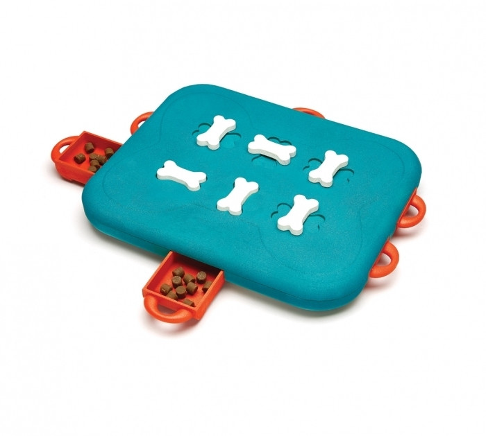 Nina Ottosson Casino interactive puzzle toy in blue with treat compartments for dogs and cats.