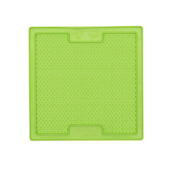 Lickimat Soother in bright green, textured mat designed for slow feeding dogs.