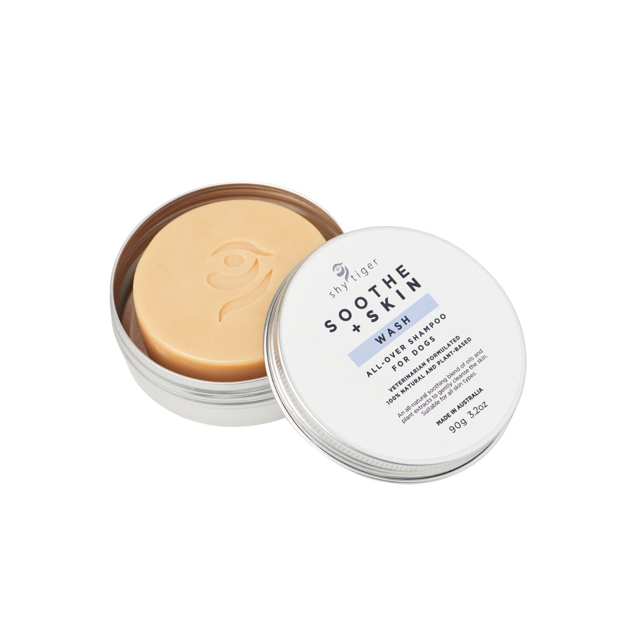 Solid shampoo bar for dogs by Shy Tiger in a metal tin, soothing skin formula.