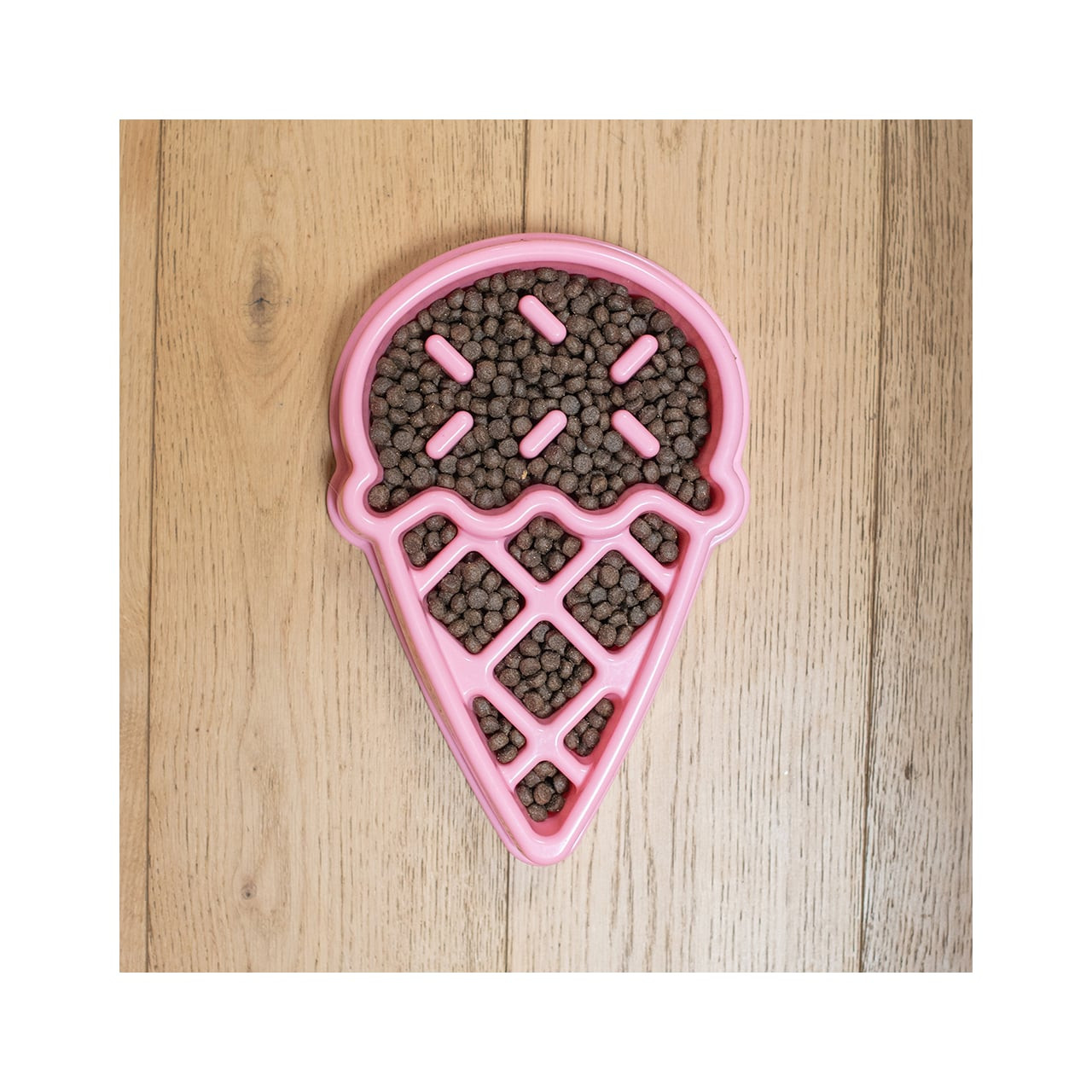 Zippy Paws Happy Bowl interactive slow feeder in ice cream shape, ideal for dogs' health.