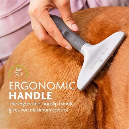 FURminator Grooming Rake featuring an ergonomic nonslip handle for easy pet grooming.