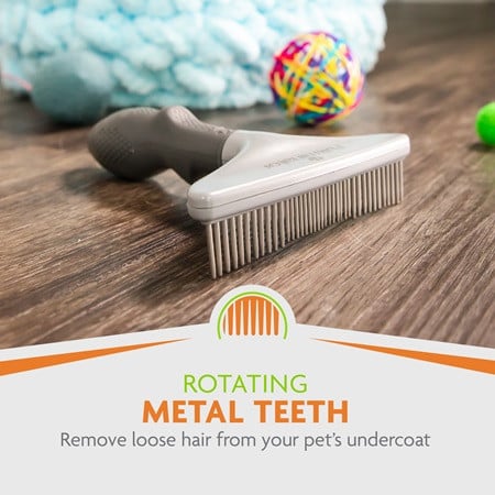FURminator Grooming Rake features rotating metal teeth to remove loose hair from pets.