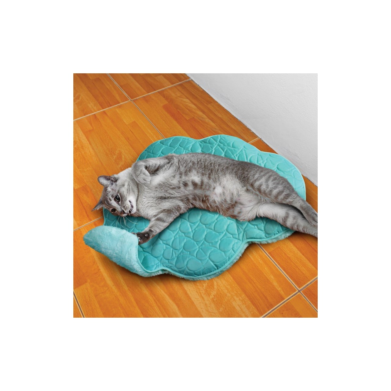 KONG PlaySpaces Cloud Cat Mat in teal with a relaxed cat lounging comfortably.