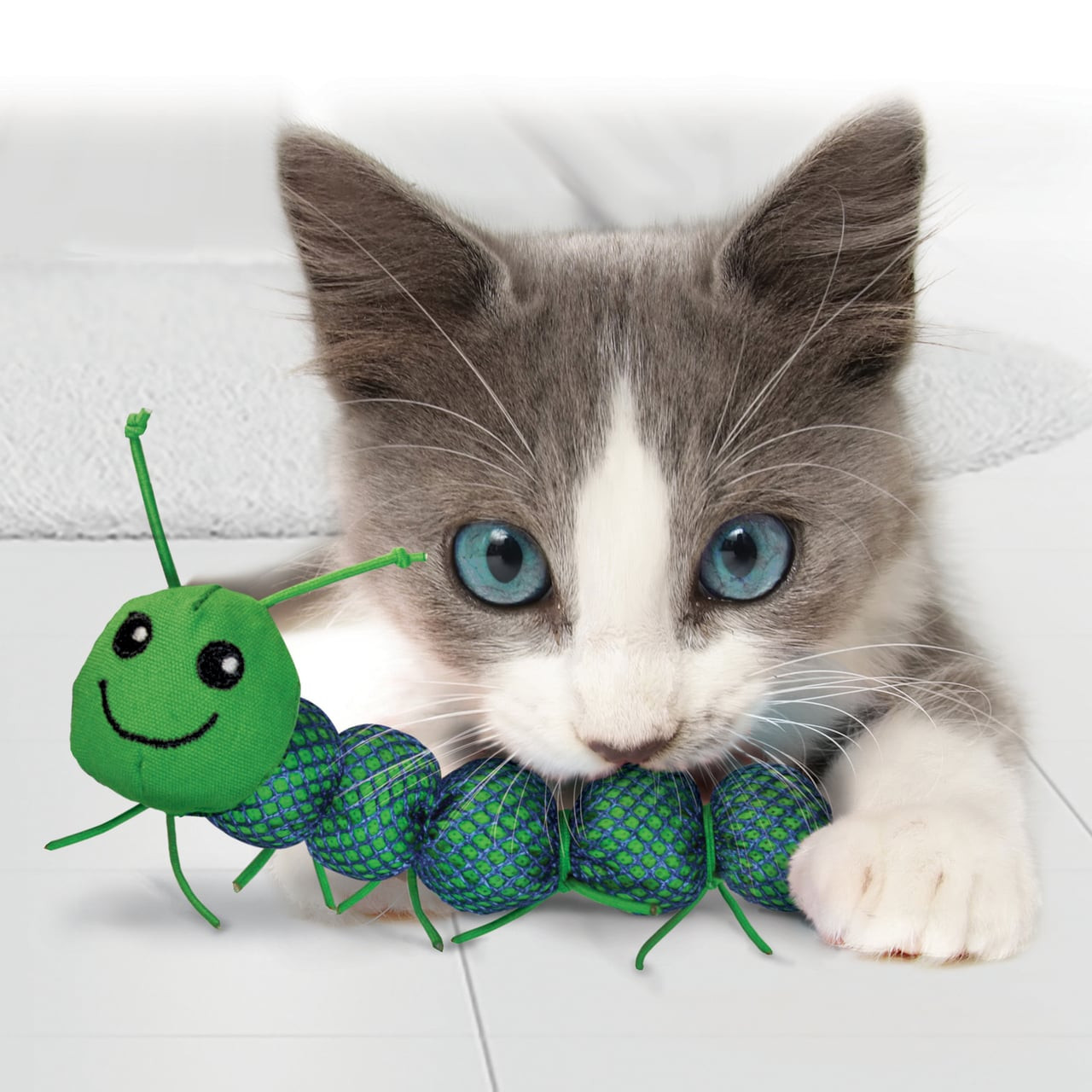 KONG Nibble Critters Catnipillar toy with a smiling caterpillar design, ideal for cats.