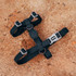 Top view of the Zee.Dog Neopro Black H-Harness range against sandy backdrop