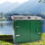 Green Razorback Metal Dual Trash Can Storage Enclosure
