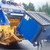 Admiral 3 cu. yd. Rear Load Plastic Dumpsters loading into truck