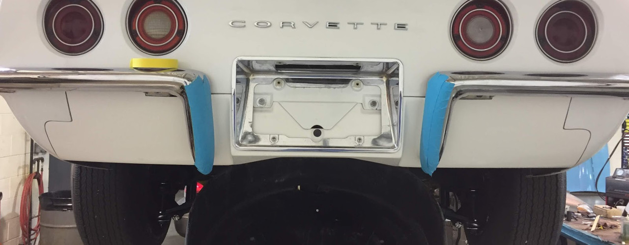 C3 - 1970-1973 EXHAUST FILLER PANEL W/EARS