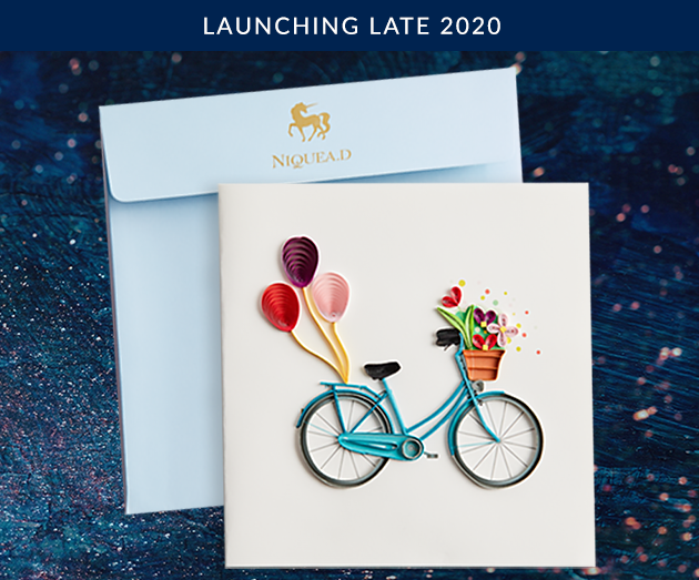 NIQUEA.D Bicycle with Flowers card with aqua colored envelope