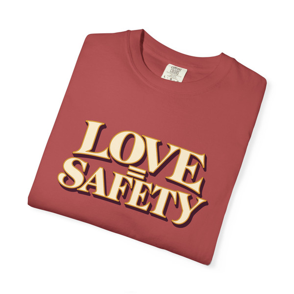LOVE = SAFETY statement T-shirt featuring a modern relationship message on a unisex tee.