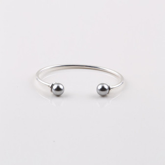 Sleek burnished silver plated open bangle with cool grey shell pearls - Size 64 mm / 67 mm