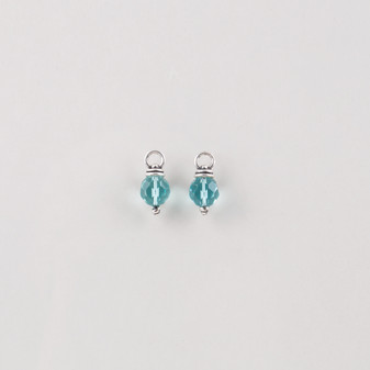 Burnished silver Pretty Woman charm earrings adorned with turquoise beads
