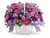 Get a handle on spring with this delightful array of floral favorites in a charming white bamboo basket accented with lavender ribbon. Surprise someone who could use a lift. It will make you both happy.