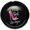 Black ceramic round ashtray with a hot pink party girl Las Vegas high-heel glamour shoe.