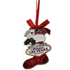 Metal Las Vegas Stocking Shape ornament that also has the Las Vegas Welcome Sign; with a Red Ribbon.