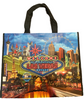 Blue background tote bag shows a Bright Neon Las Vegas Welcome sign over Las Vegas Casinos in bright colors.