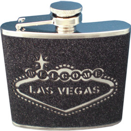 Metal Flask with a Black Glitter wrap around textured feel. The Las Vegas Welcome Sign is etched out as the design on the front.