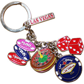 Las Vegas Keychain with dangling metal charms of dice, poker chip stack, big poker chip, a roulette wheel... and of course Las Vegas. 