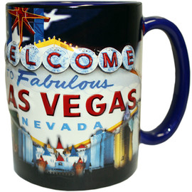 Oversized Las Vegas ceramic coffee mug with a prominent Las Vegas Sign design embossed design with a patriotic flag background, side view.