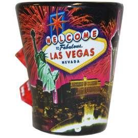 Ceramic black Las Vegas Fireworks shotglass showing the famous Casinos with Fireworks bursting in the background. 