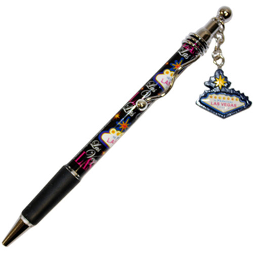 Black design pen with  Las Vegas written all over it.  There is a small dangle charm that hangs from the top. Charm is shaped like the Las Vegas Welcome Sign.