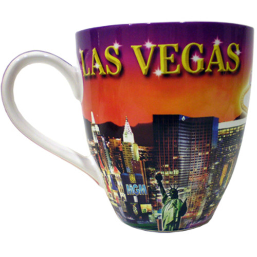 Oversized Las Vegas ceramic coffee mug with a Las Vegas Sunset collage design on a vibrant strip background, side view.