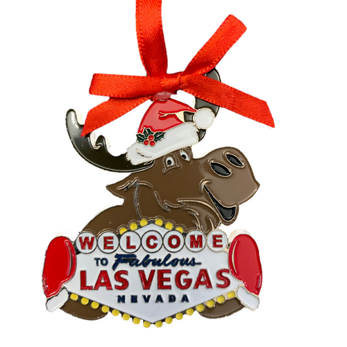 Metal Las Vegas Moose Shape ornament that also has the Las Vegas Welcome Sign; with a Red Ribbon.