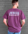 Lifestyle image of a man facing a gray brick wall while wearing the Jesus had 12 men too t-shirt. Lifestyle image of a man facing a gray brick wall while wearing the Jesus had 12 men too t-shirt.