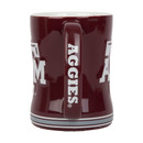 Maroon Texas A&M ceramic mug featuring a large white Texas A&M logo with gray accent stripes near the base. Coffee mug perfect for home, office, game days, and everyday use.